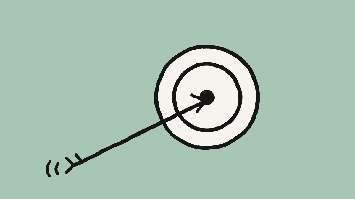 A hand-drawn arrow striking the center of a bullseye target.